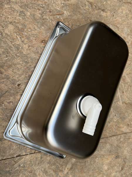 Compacte rechthoekige wasbak, smal model. Onderkant